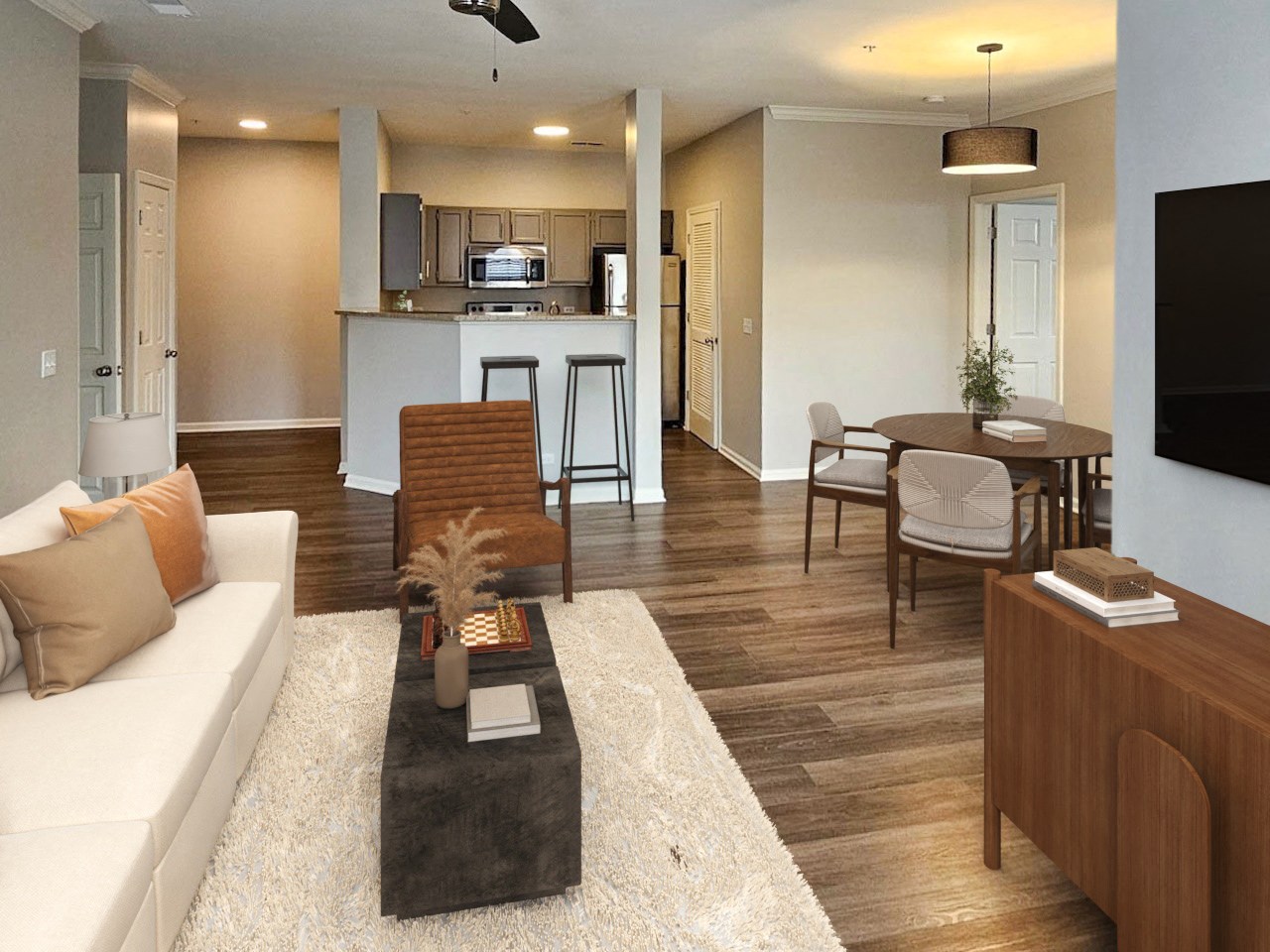 Contemporary living area with stylish leather seating and hardwood floors
